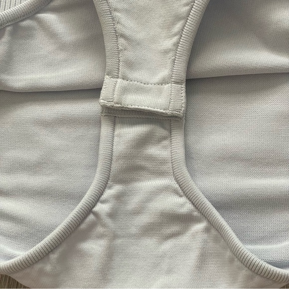 Tibi Ribbed Knit Button Snap Front Point Collared Polo Bodysuit in Light Blue - Picture 6 of 12